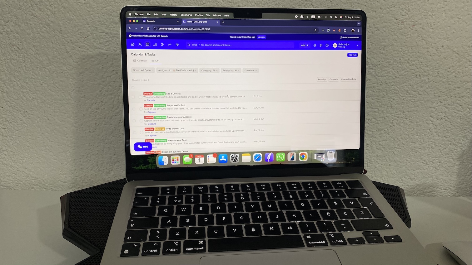 Capsule CRM calendar and task list view showing onboarding tasks with due dates, categories, and assignment filters.