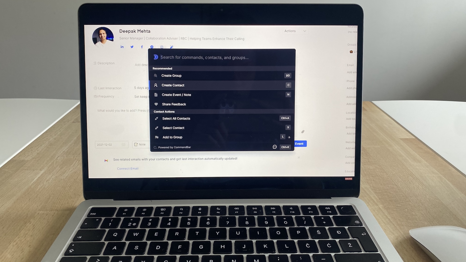 Laptop showing Dex CRM’s contact profile view with CommandBar overlay, highlighting quick actions like create group or event.
