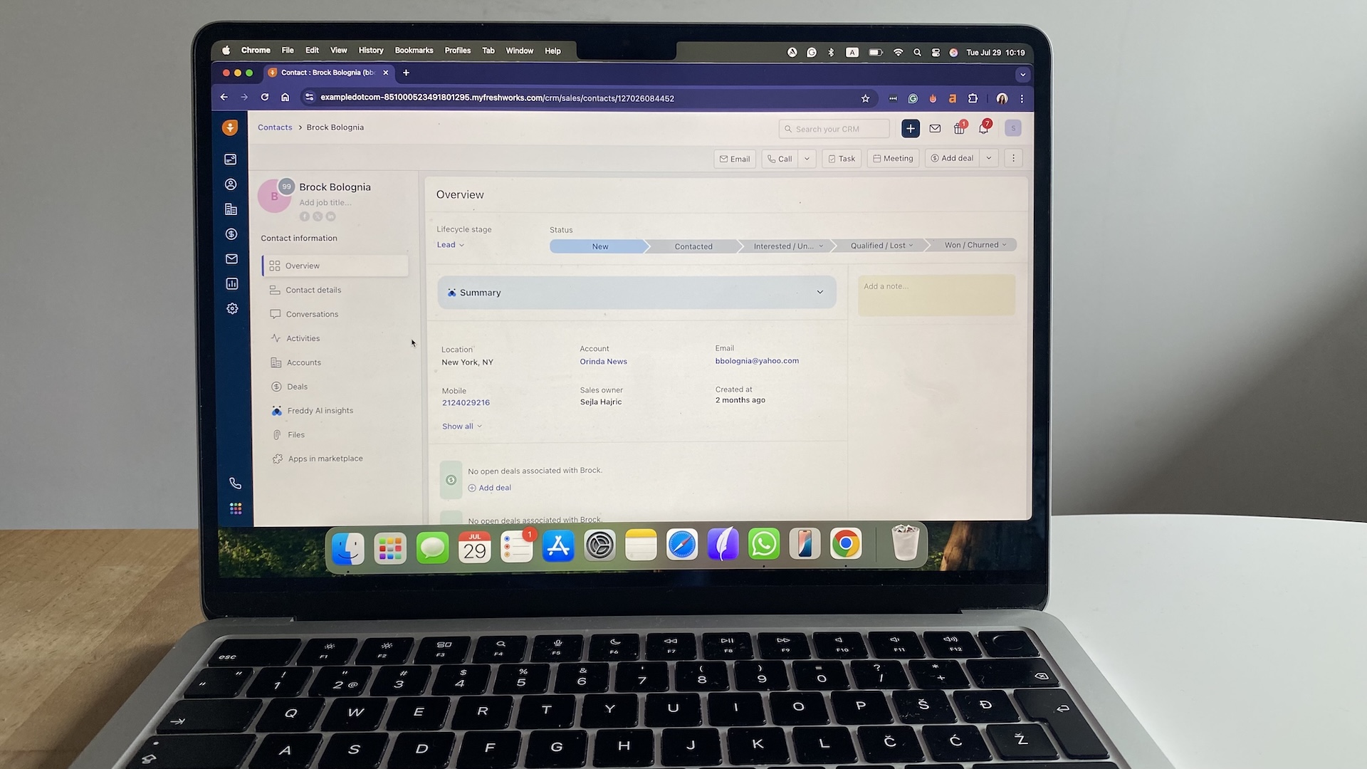Freshsales CRM contact overview screen showing lead details, lifecycle stage, and communication options.