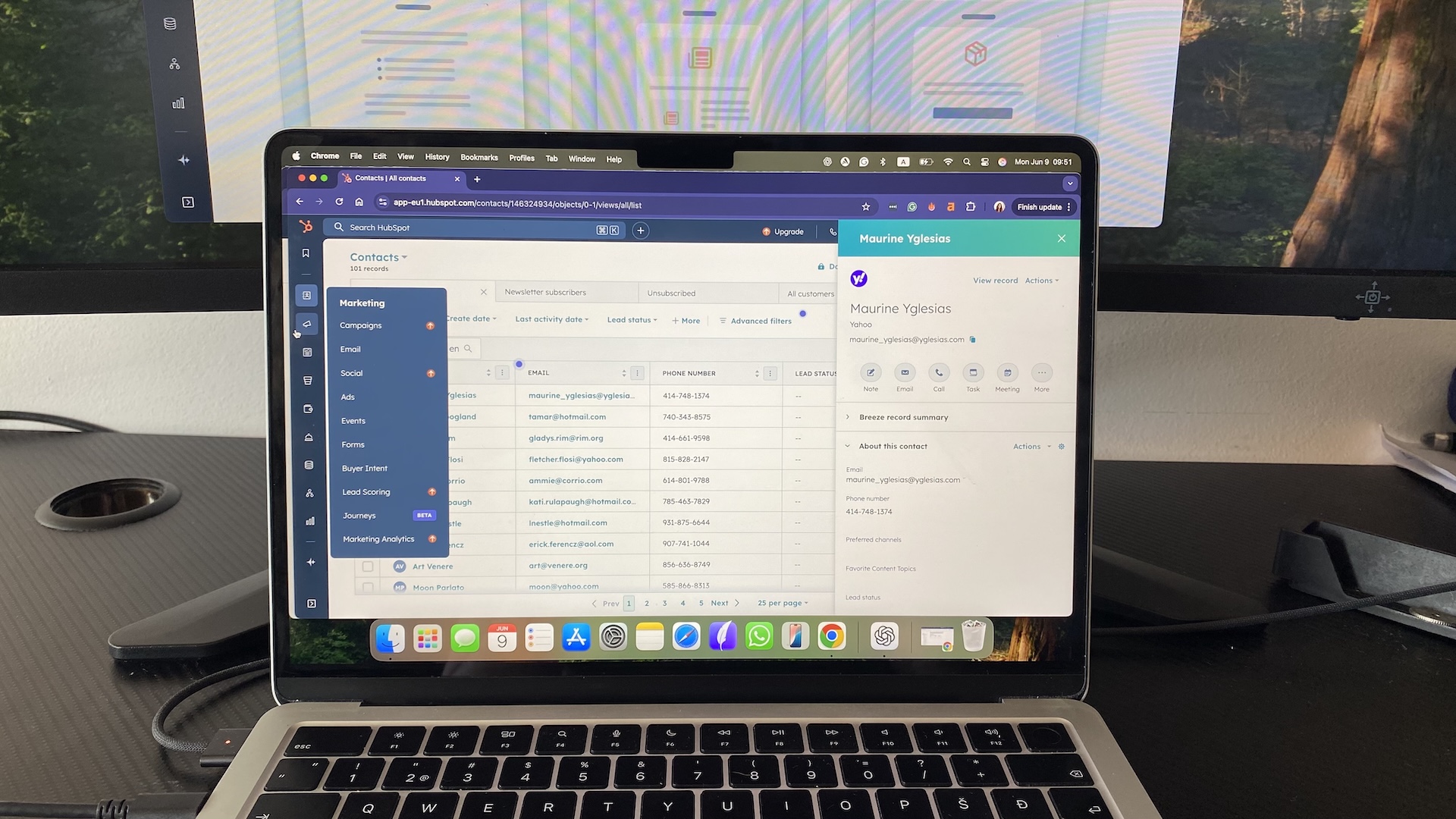 HubSpot CRM contact record with sidebar navigation open, showing marketing tools and contact details panel.