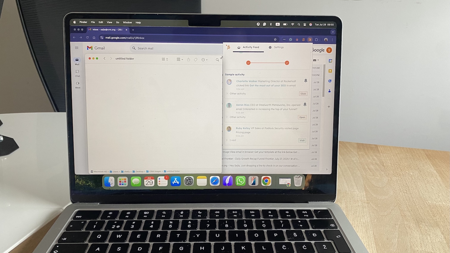 "HubSpot Gmail integration showing activity feed in Gmail with email opens, link clicks, and page visits logged for contacts