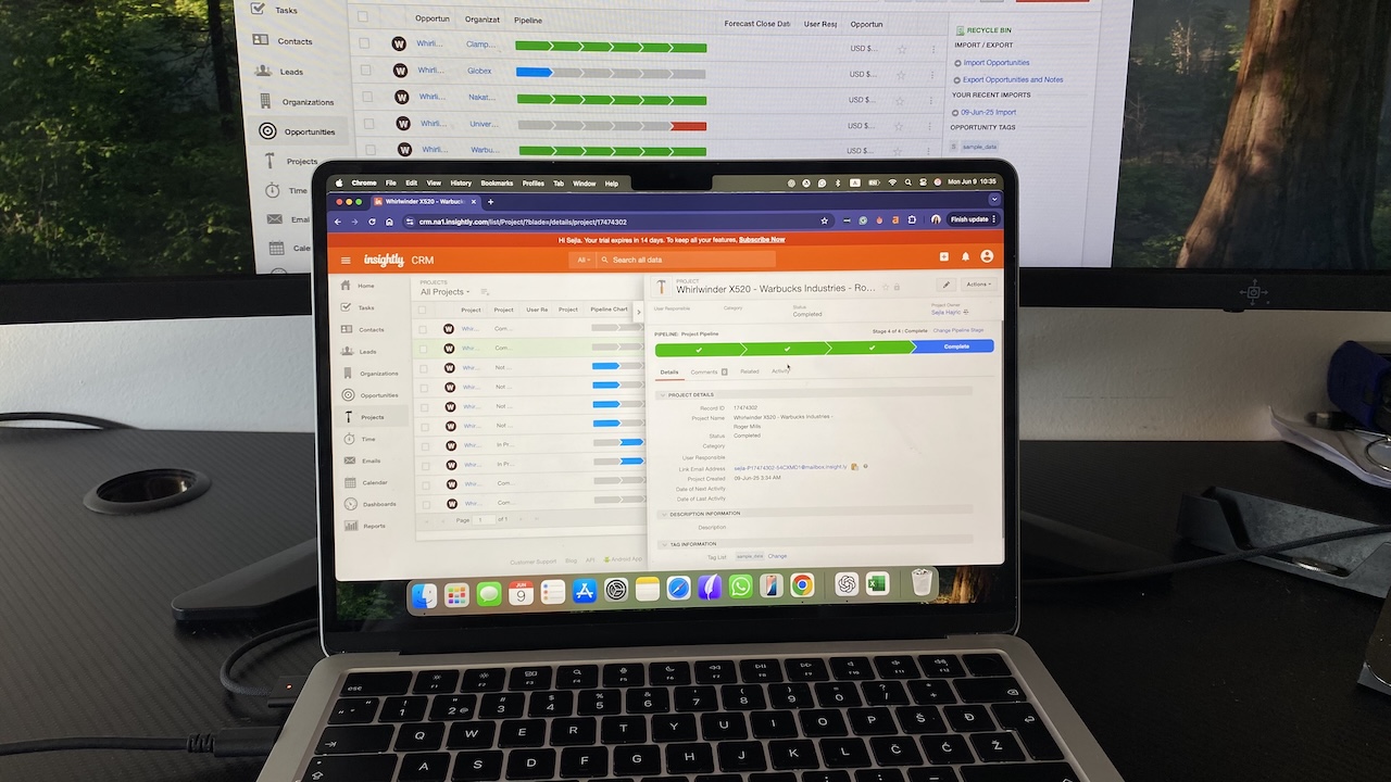 Insightly CRM project pipeline view on laptop screen with task tracking and visual project stage