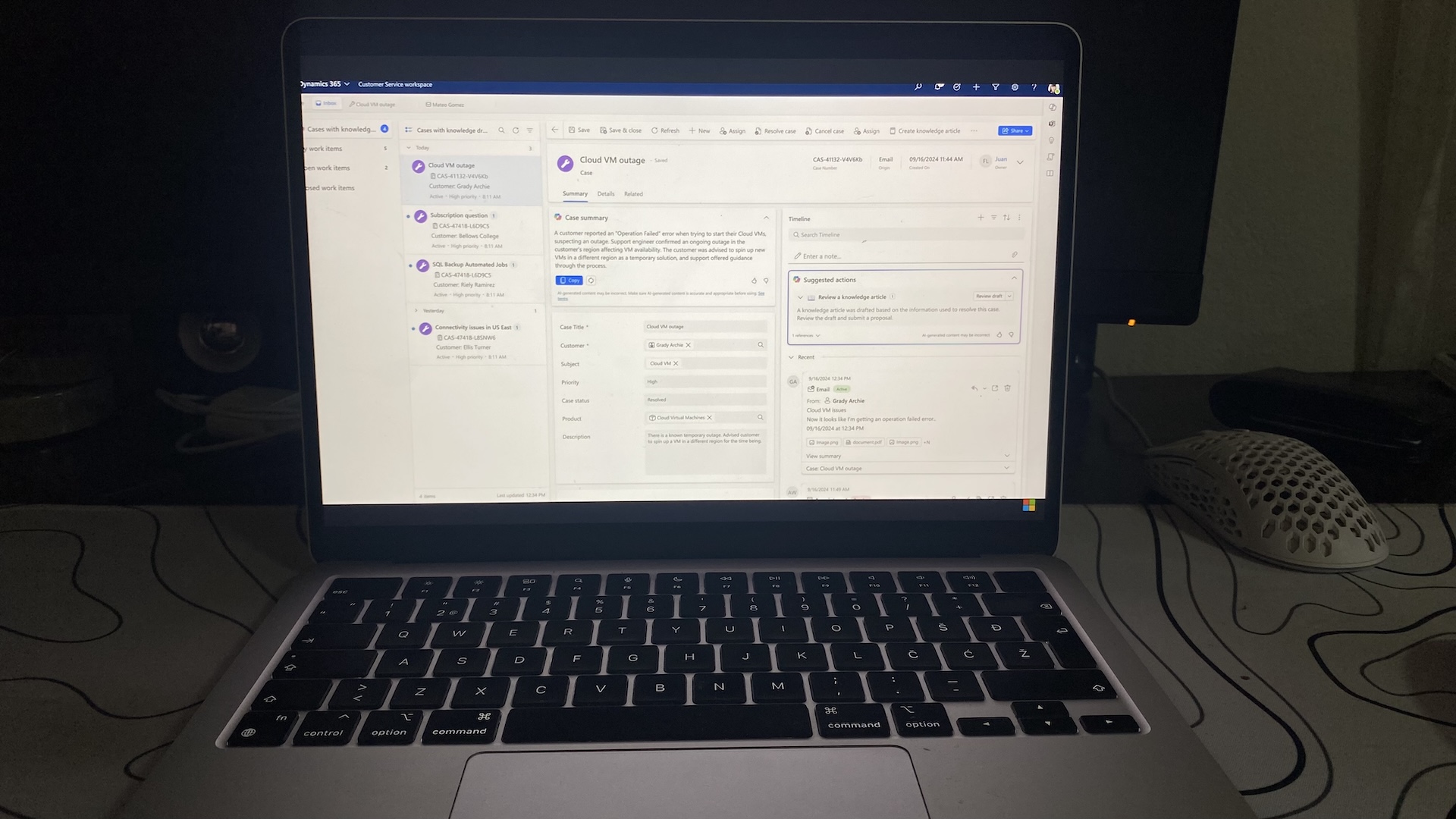 Microsoft Dynamics 365 workspace showing active support cases with case summary and suggested actions.