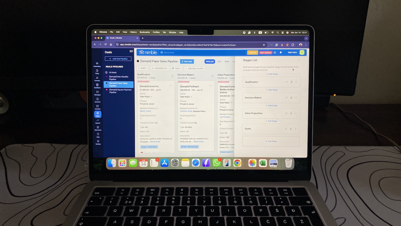 Laptop showing Nimble CRM’s deals pipeline editor with stage customization panel open.