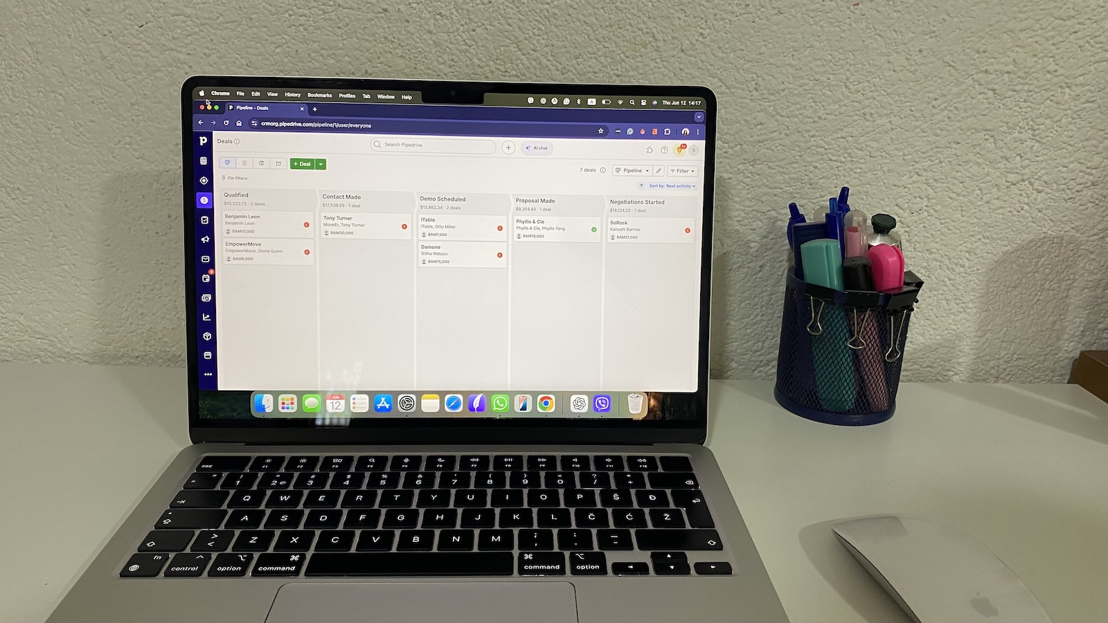 Kanban-style pipeline in Pipedrive showing deal stages from Qualified to Negotiations Started